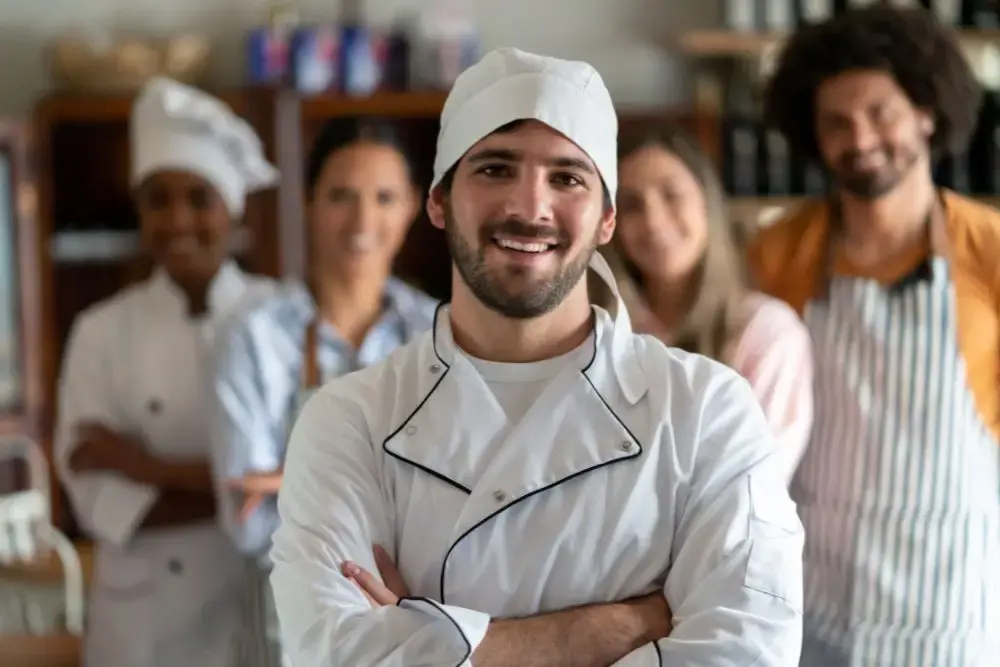 Chef with team in background