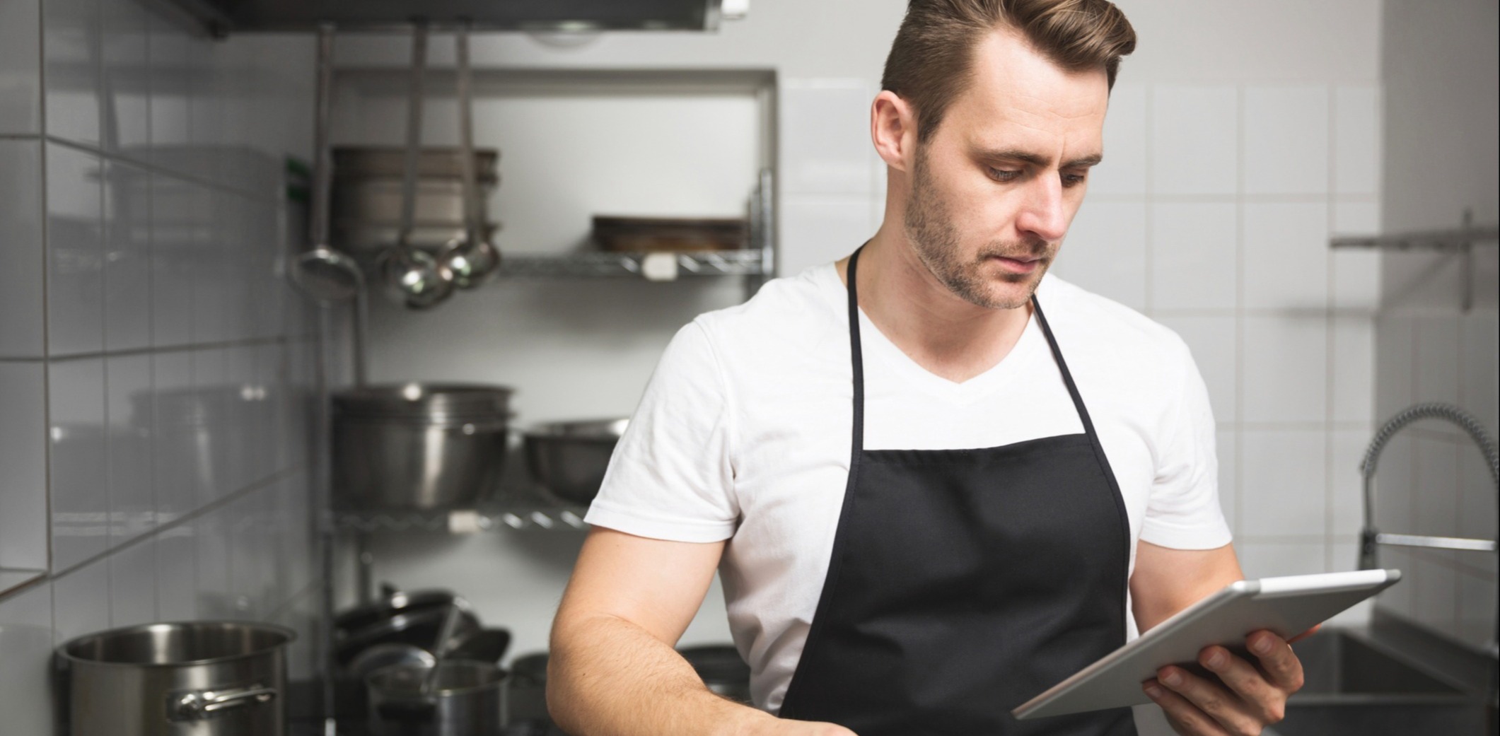 Chef in kitchen using Chomp-1