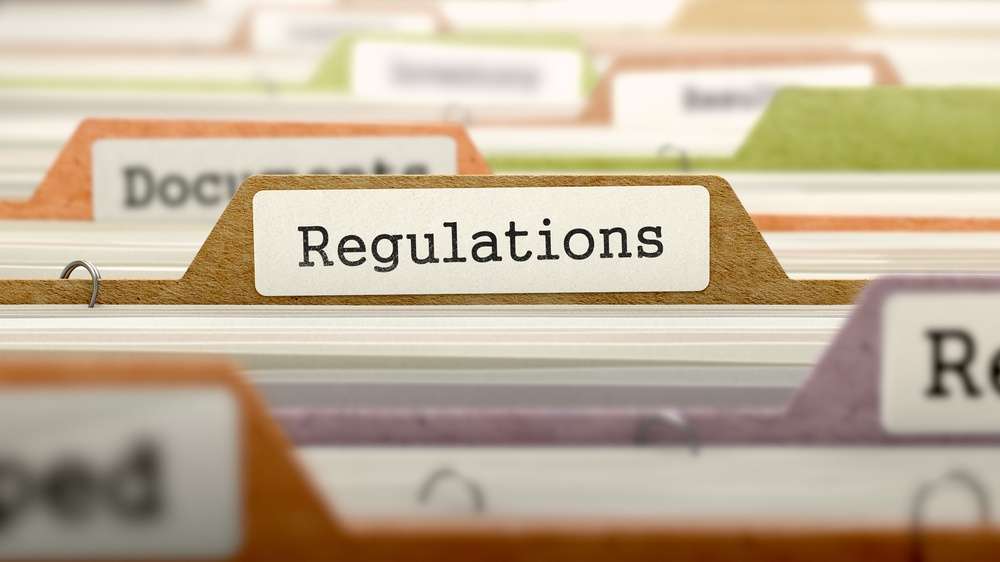 Filing cabinet with a folder called regulations