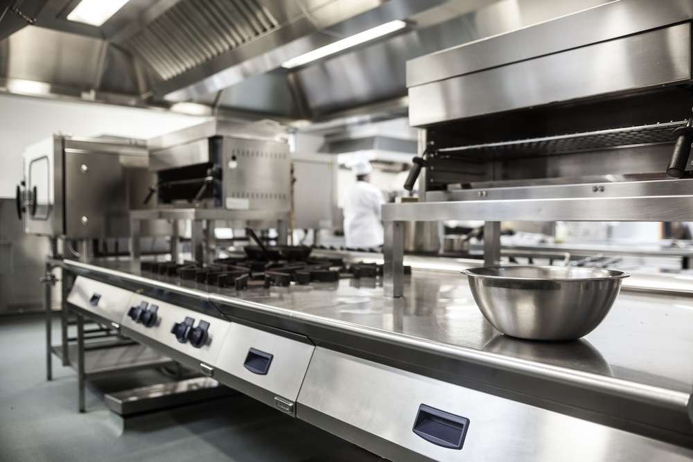 Maintainging a clean commerical kitchen reduces the risk of foodborne bacteria.