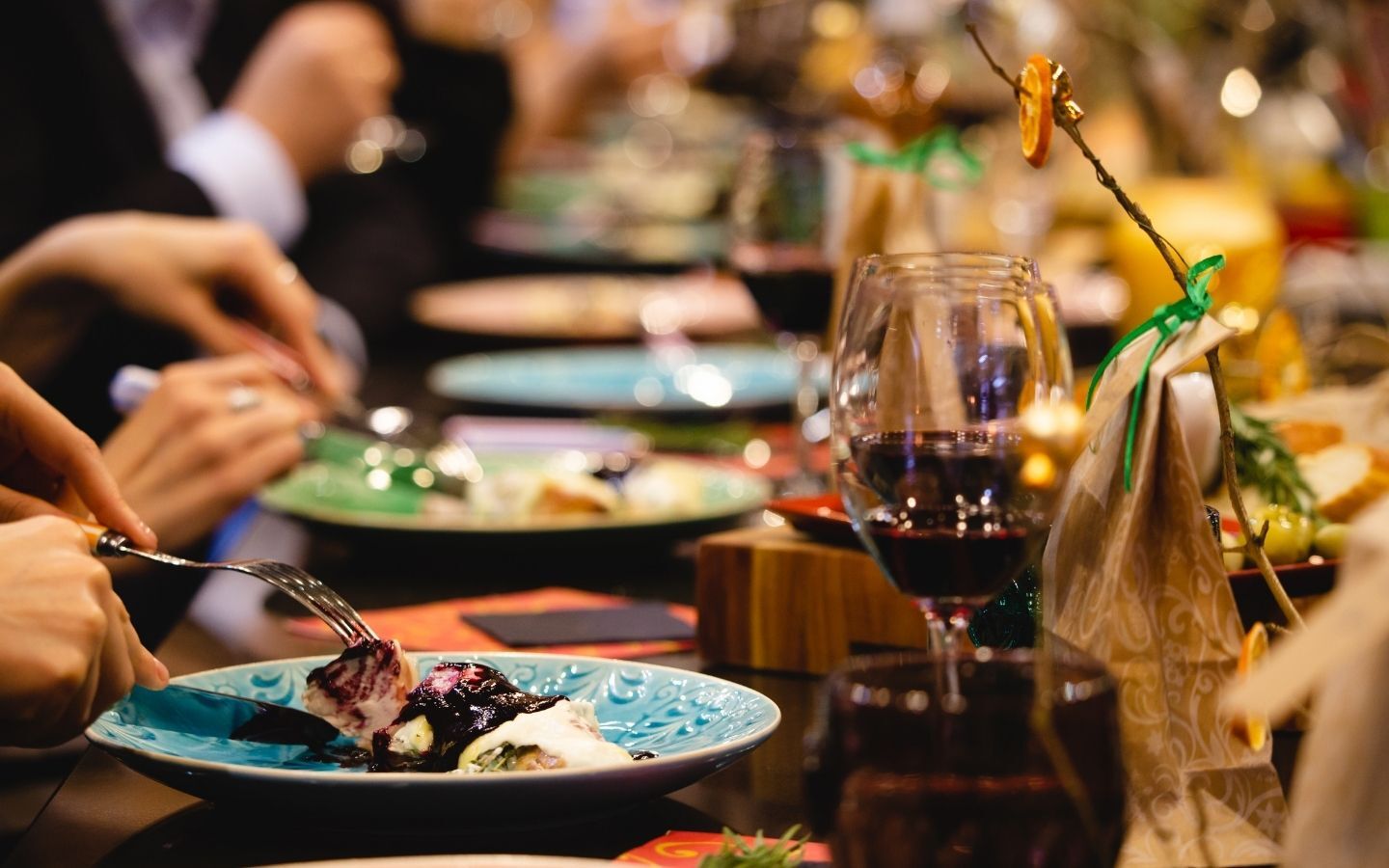A close up of plates of food at a table in a restaurant