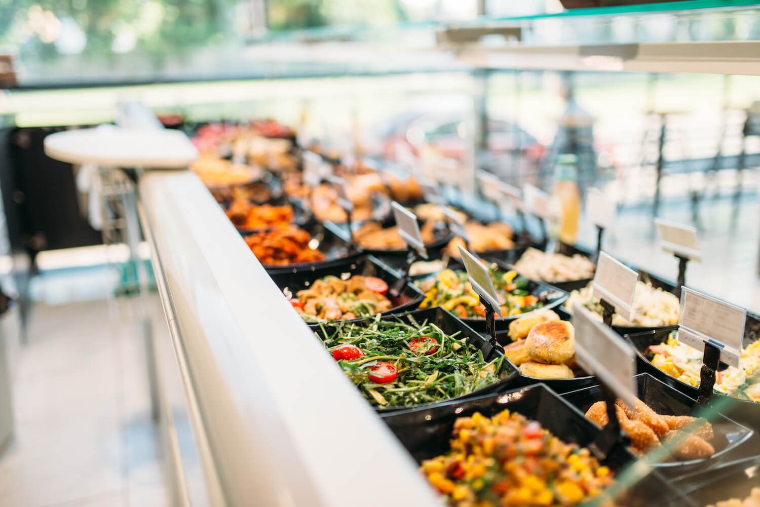 Fresh salads in cabinet display