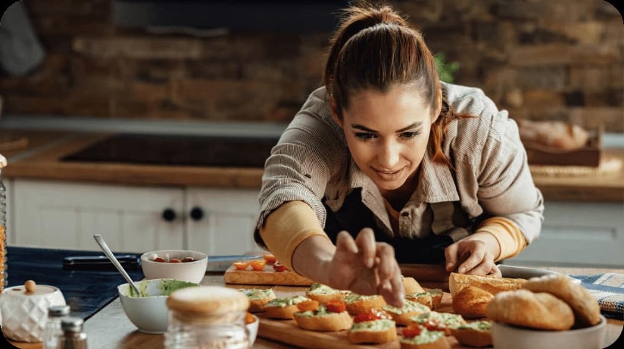 Female chef prepping food-resized