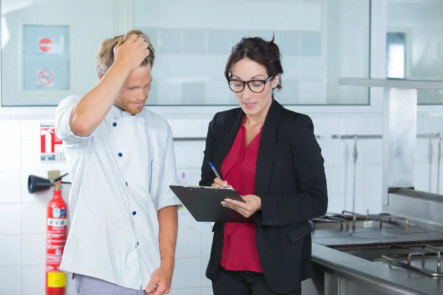 worried chef with auditor